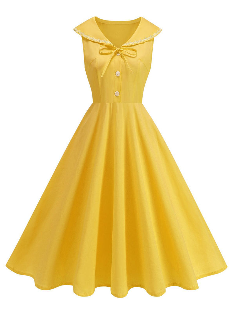 Robe sans manches col marin et nœud papillon couleur unie années 1950