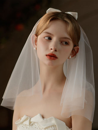 Voile de mariée blanc avec nœud vintage