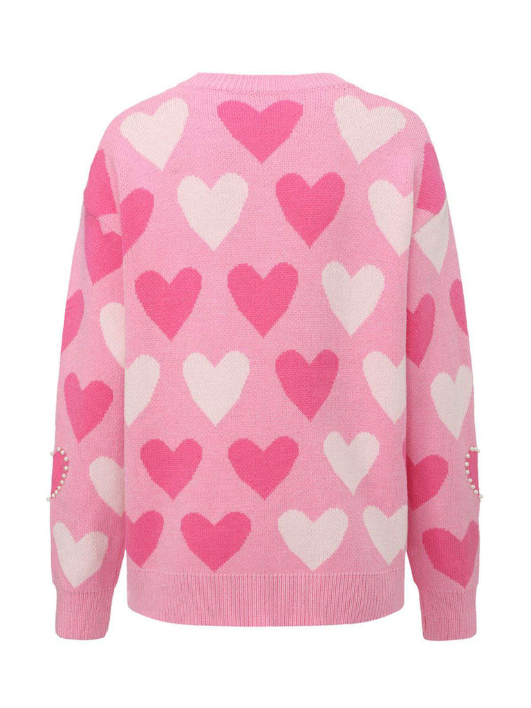 Pull rose perles en forme de cœur années 1950