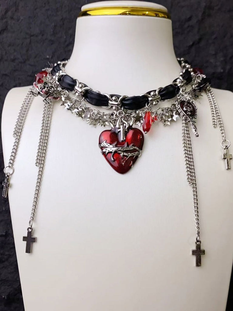 Collier ras-du-cou gothique en cuir avec croix et pompon