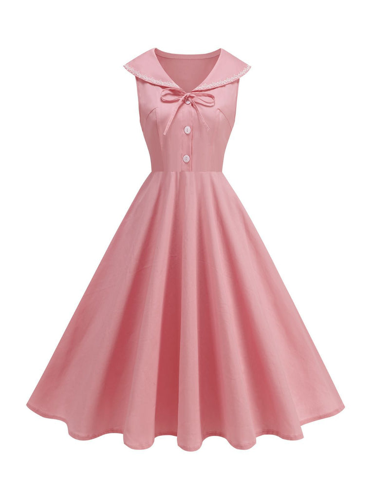 Robe sans manches col marin et nœud papillon couleur unie années 1950