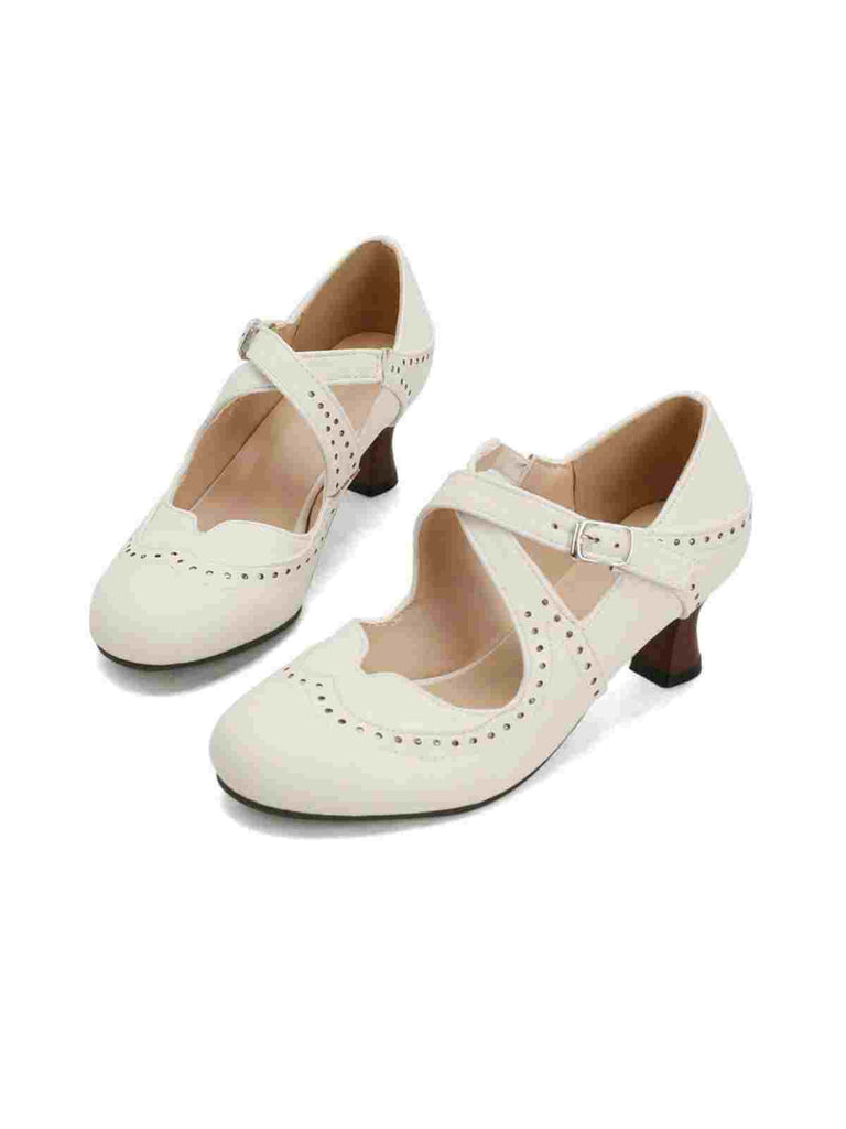 Escarpins Mary Jane à talons chaton perforés et brides croisées