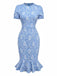 Robe bleu clair marguerites à manches bouffantes années 1960