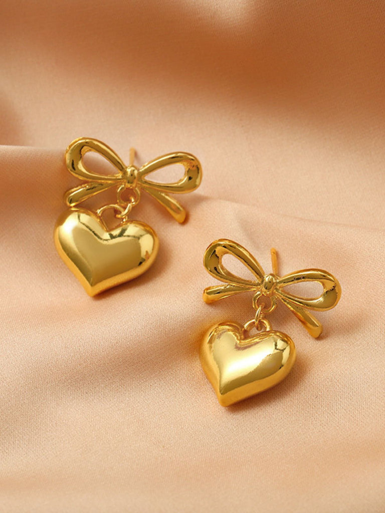 Boucles d'oreilles pendantes en alliage avec nœud en forme de cœur