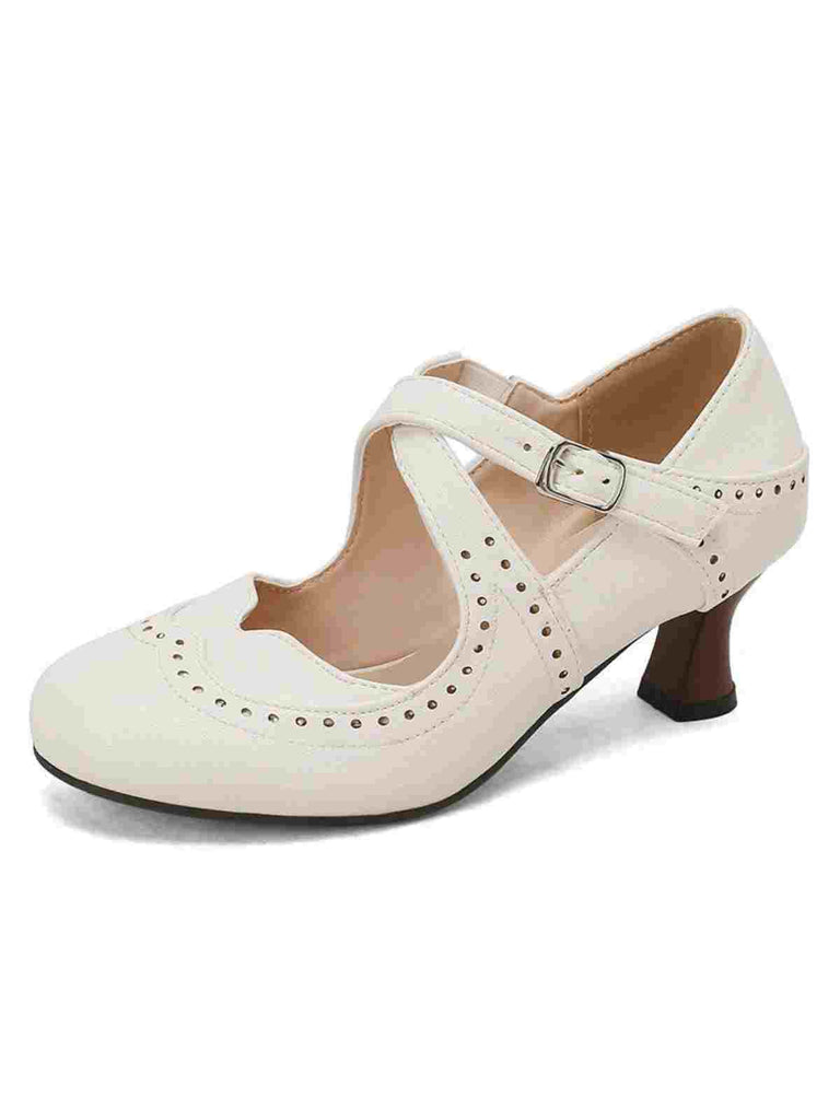 Escarpins Mary Jane à talons chaton perforés et brides croisées