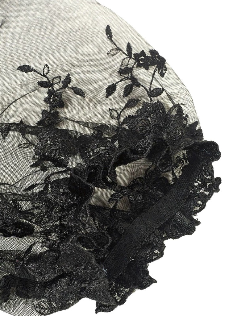 Haut corset en dentelle noir à manches bouffantes des années 1970