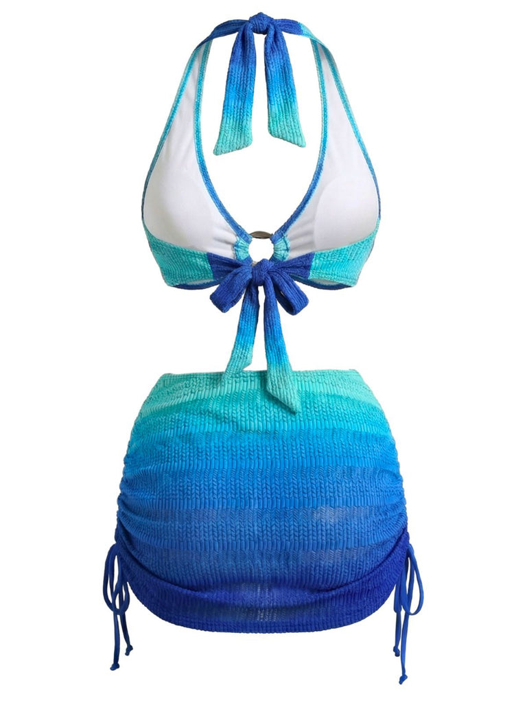 Blue and white bikini top with matching bottom on a white background