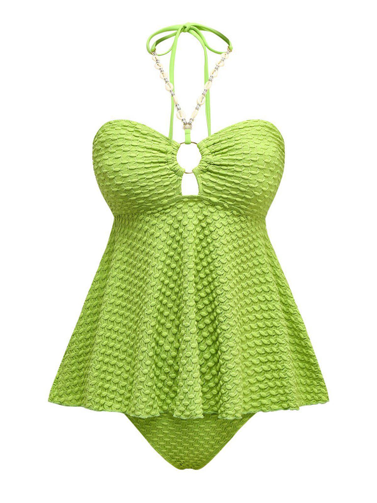 Maillot de bain dos nu à lacets et chaîne coquillages des années 1940