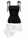 Robe noire à col carré et nœud papillon rouge années 60