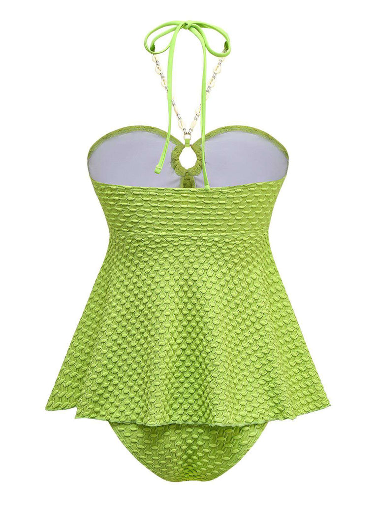Maillot de bain dos nu à lacets et chaîne coquillages des années 1940