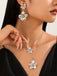 Ensemble collier et boucles d'oreilles à double clavicule florale
