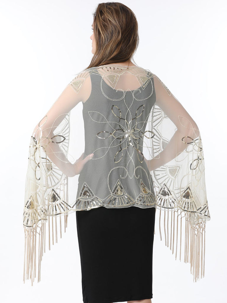 Cape en maille à paillettes et pompons des années 1920