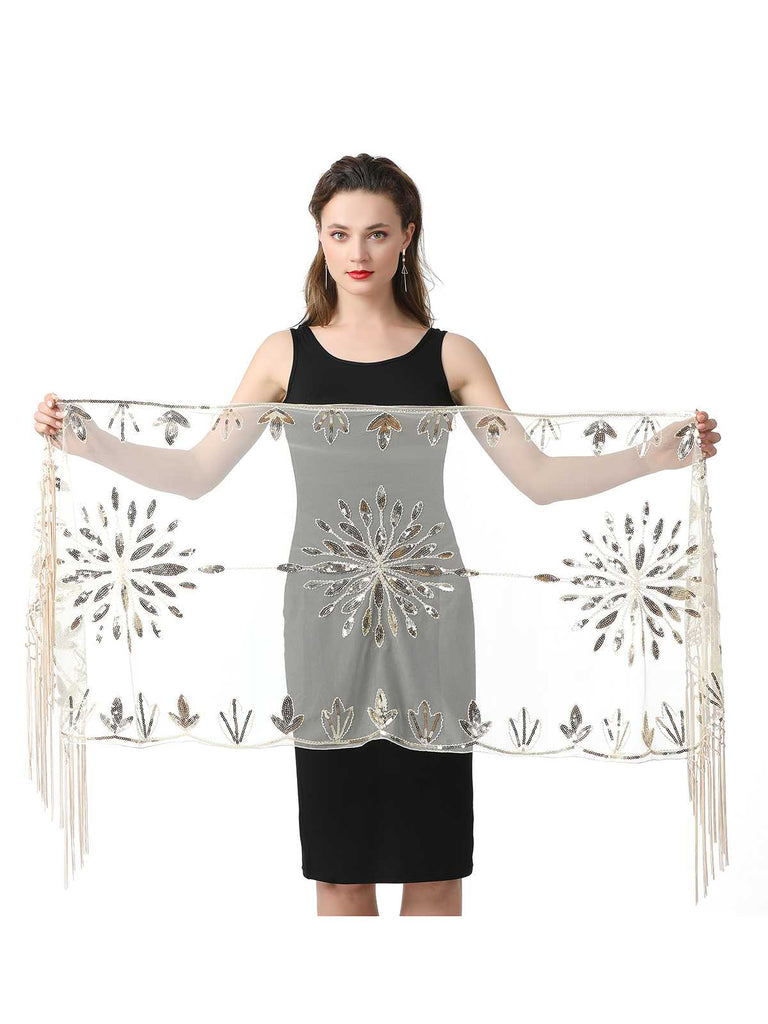 Cape en maille à paillettes et pompons des années 1920