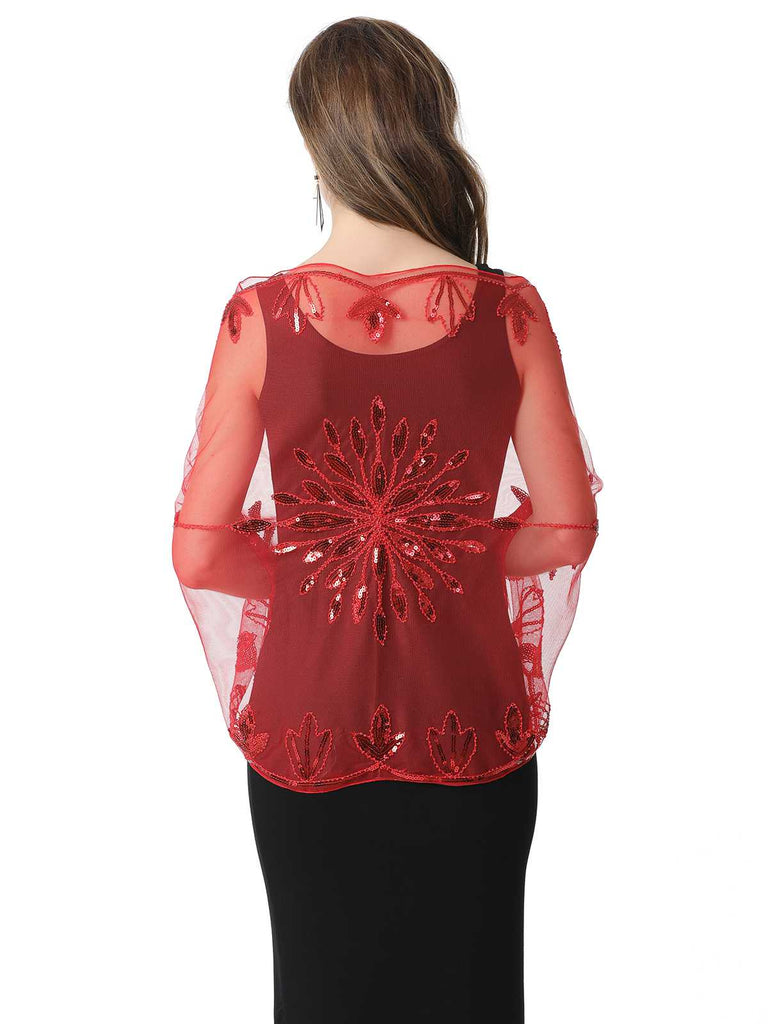 Cape en maille à paillettes et pompons des années 1920