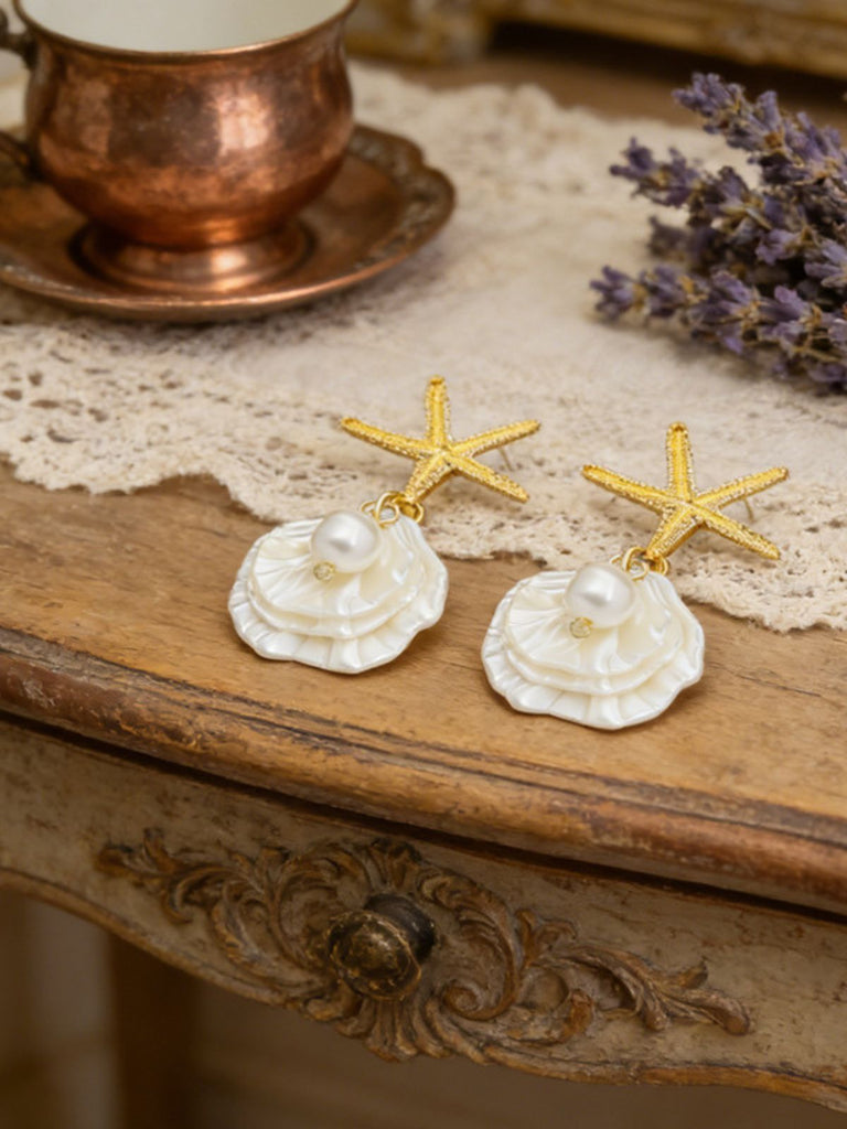 Boucles d'oreilles pendantes en coquillage d'étoile de mer doré perle