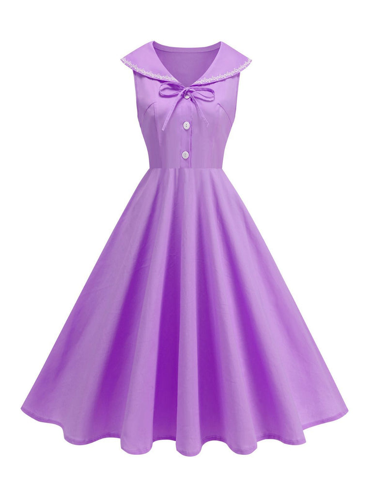 Robe sans manches col marin et nœud papillon couleur unie années 1950