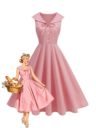Robe rose sans manches col marin et nœud papillon années 1950