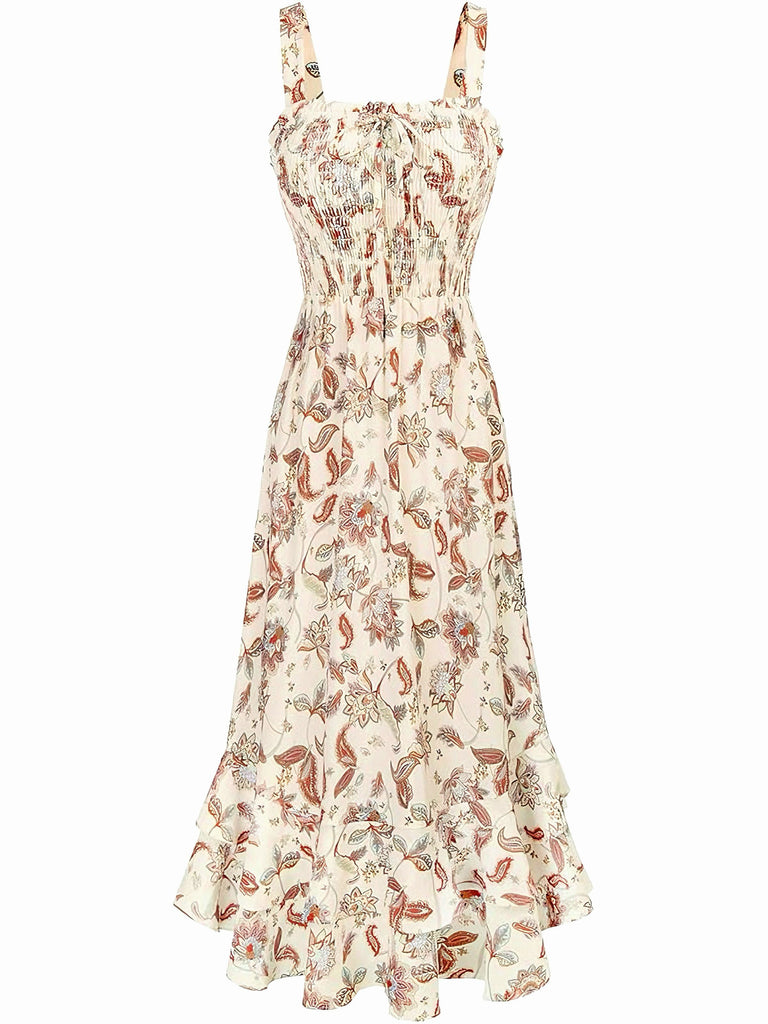 Robe à fleurs à fines bretelles sur fond blanc