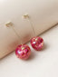 Boucles d'oreilles cerise fleurs séchées rouges