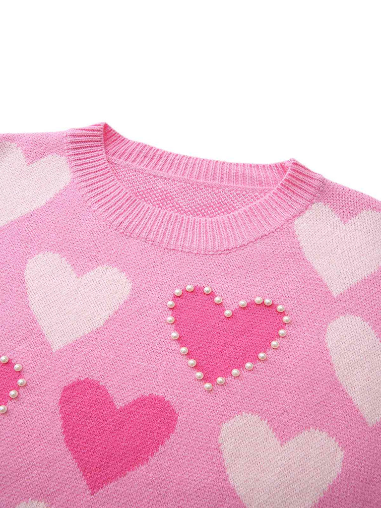 Pull rose perles en forme de cœur années 1950