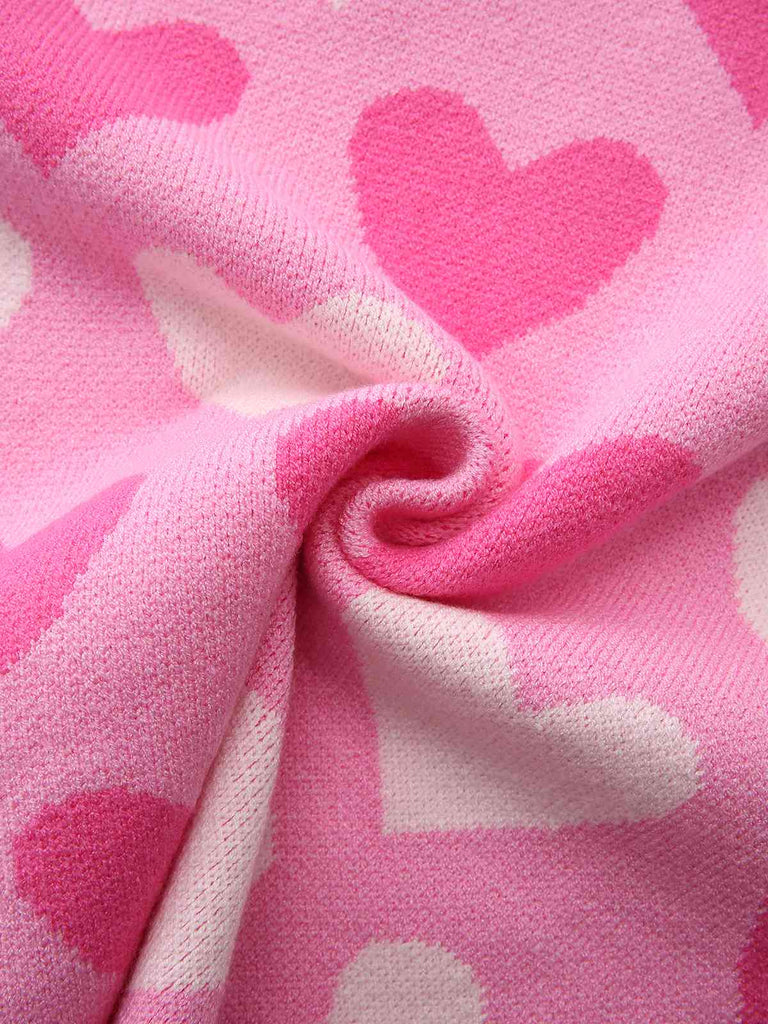 Pull rose perles en forme de cœur années 1950