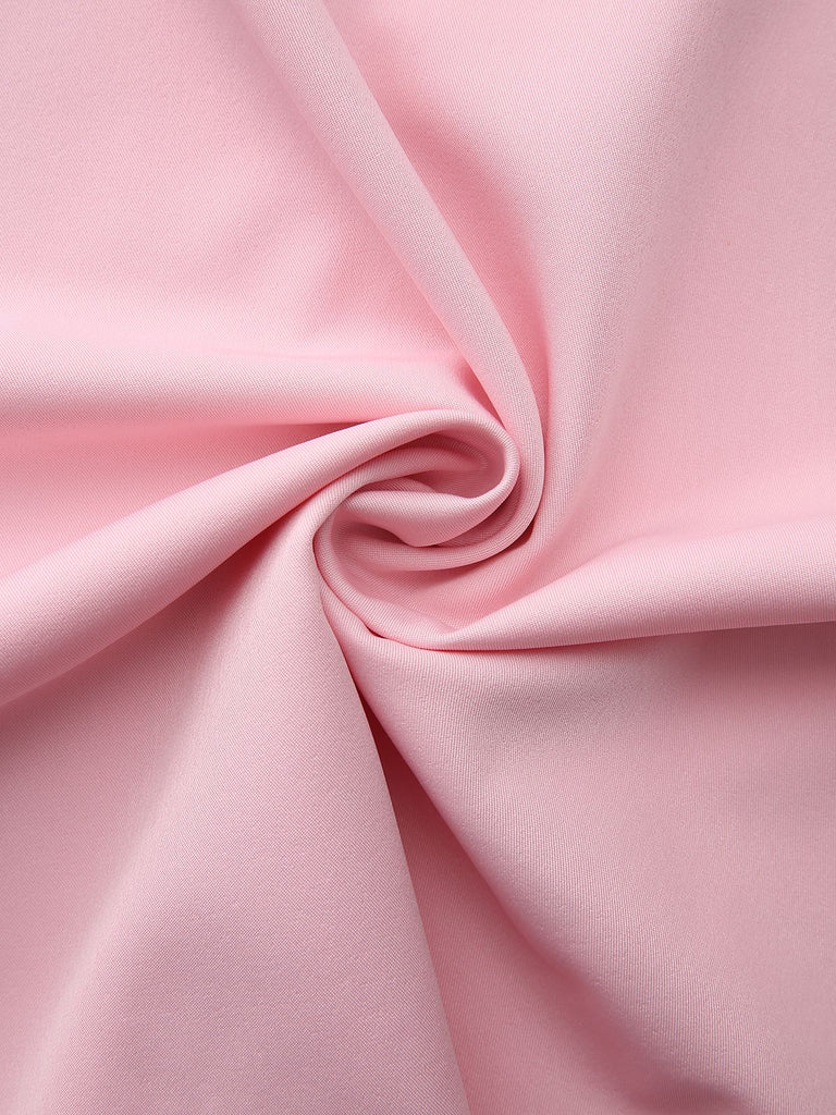 Robe capelet à revers uni des années 1950