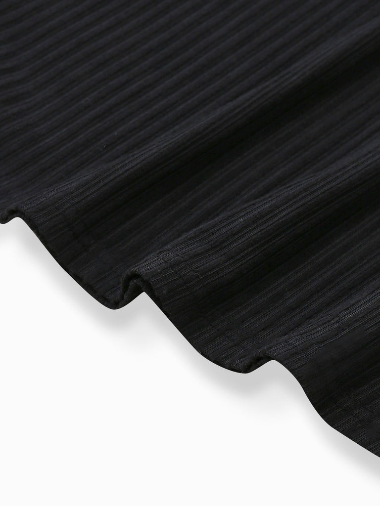 Robe en maille côtelée noire bordure en fausse fourrure léopard style années 1940