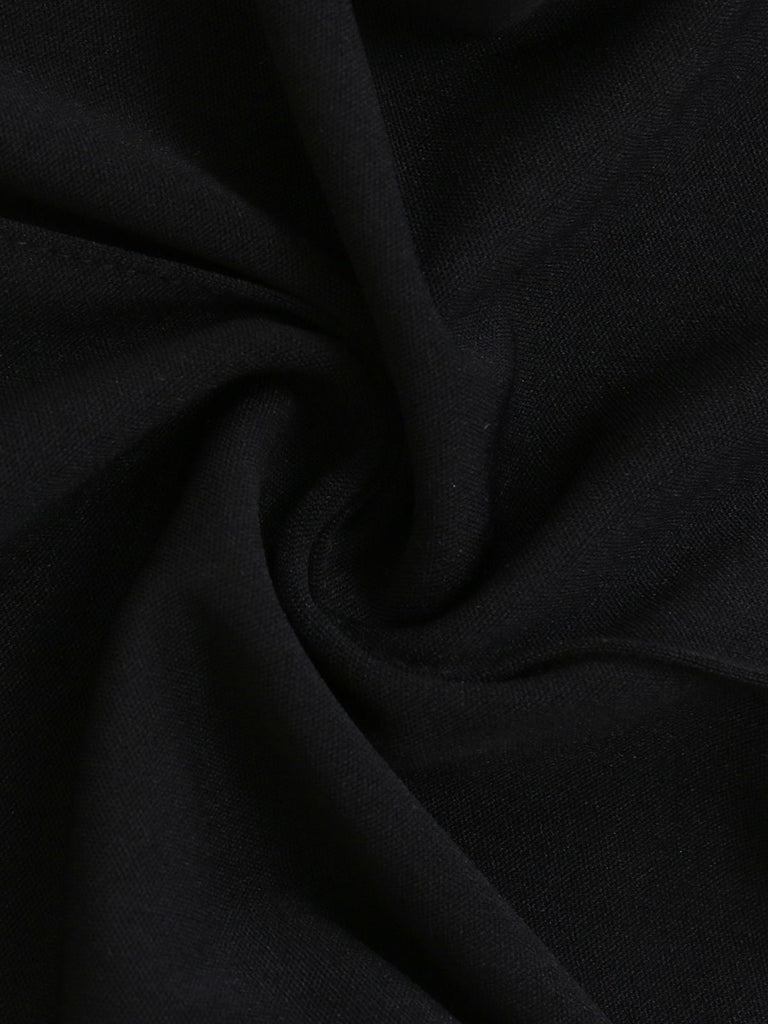 Combinaison noire à col roulé et cordon de serrage années 1930