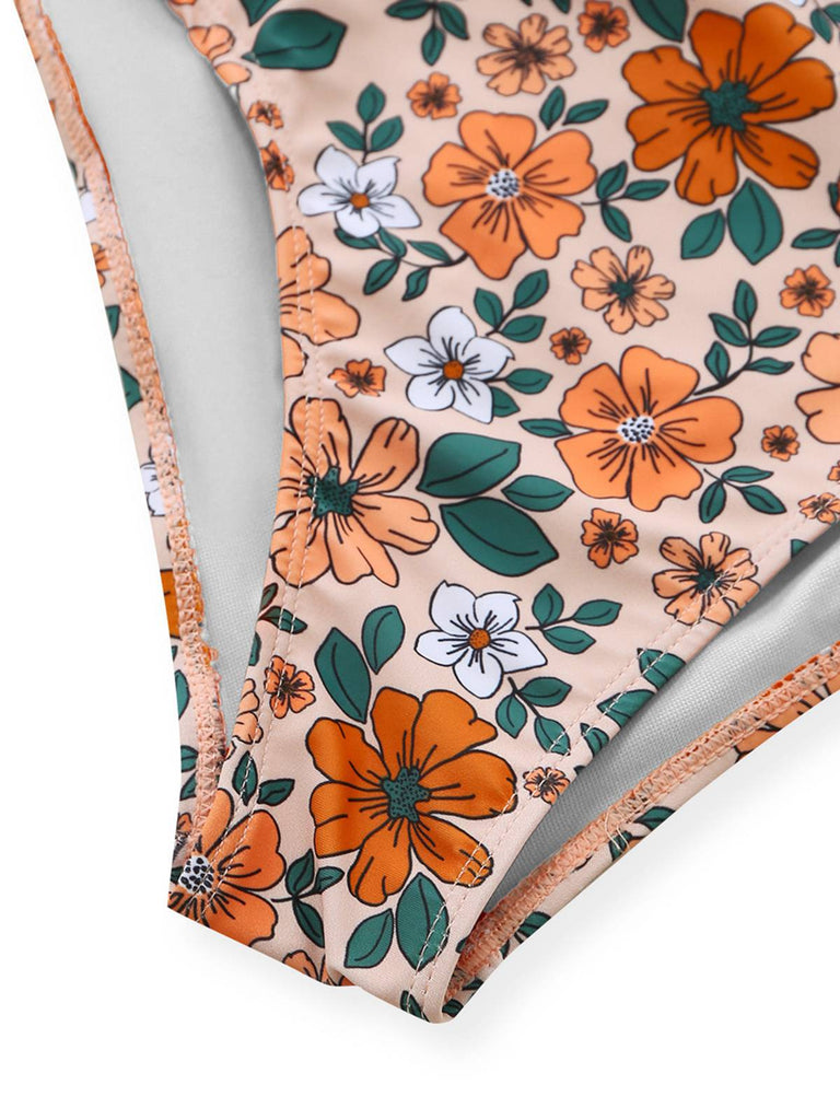 Maillot de bain une pièce à volants et découpes florales nœud sur le devant années 1930