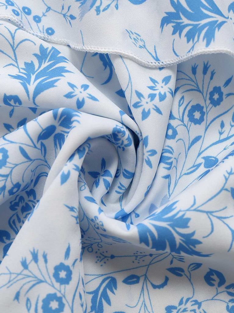 Robe fleurie à volants bretelles ourlet superposé bleues années 1970