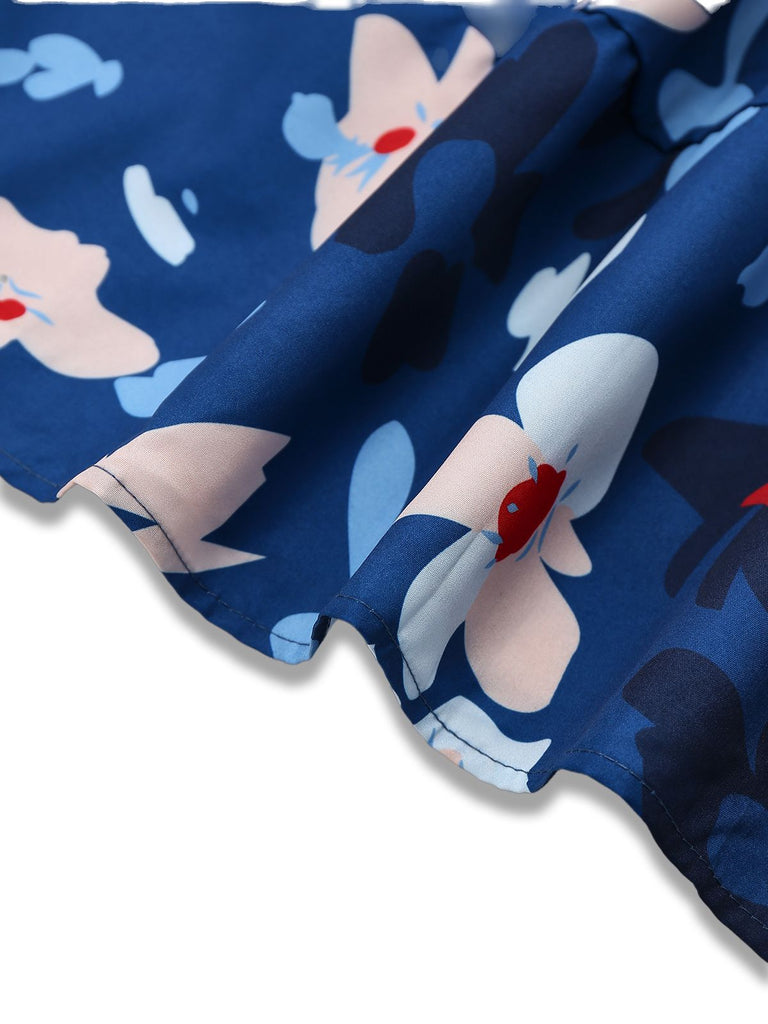 Robe bleue à fleurs manches bouffantes épaules dénudées années 1940