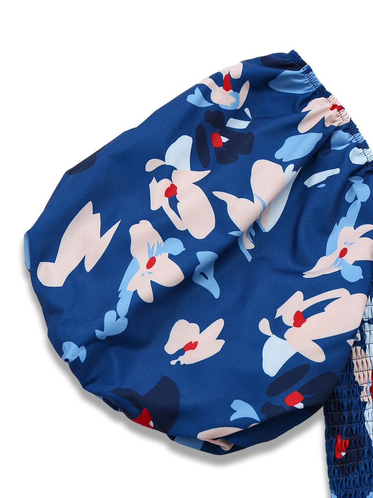 Robe bleue à fleurs manches bouffantes épaules dénudées années 1940