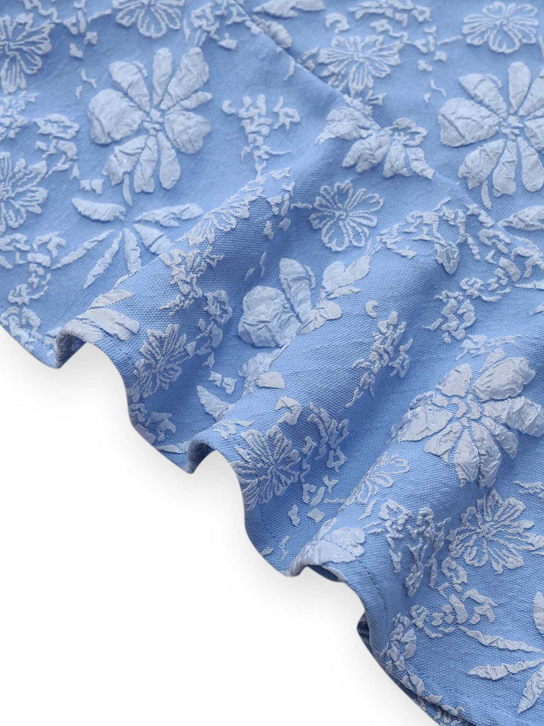 Robe bleu clair marguerites à manches bouffantes années 1960