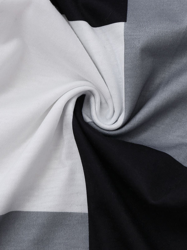 Combinaison noire et blanche à bretelles à carreaux années 1960