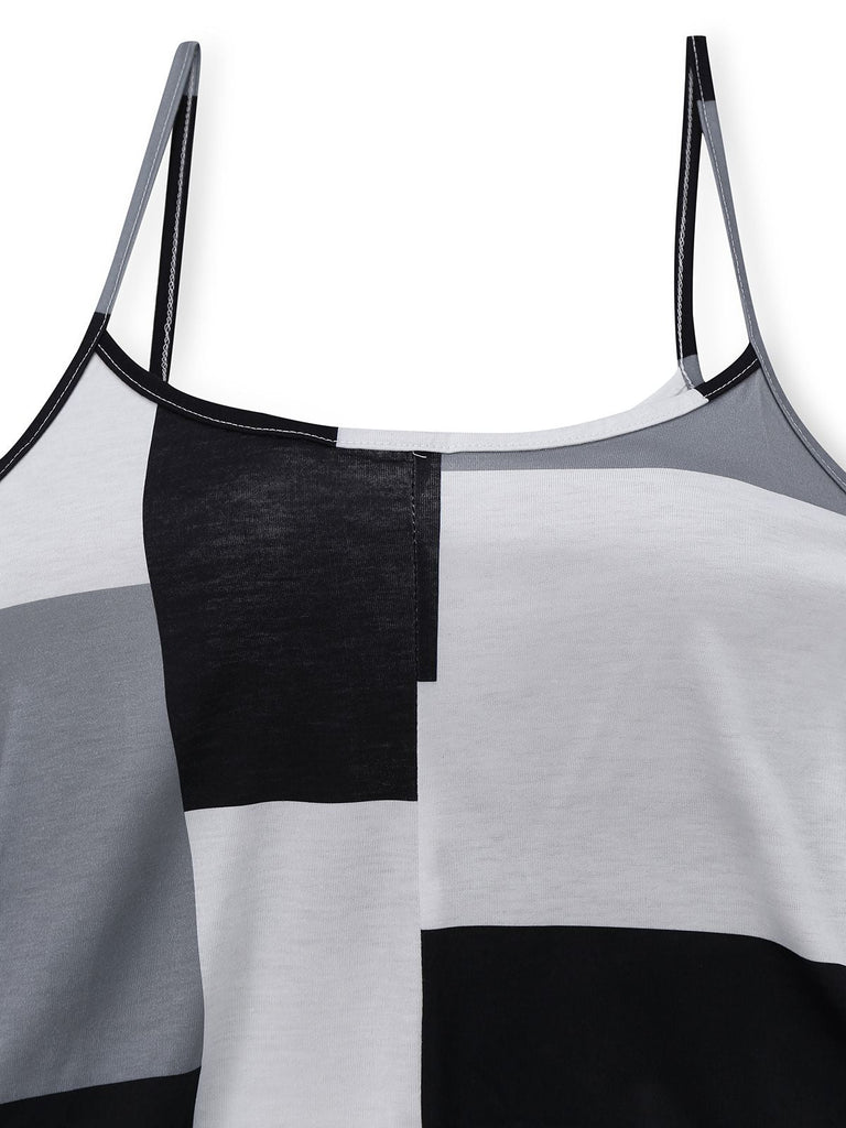 Combinaison noire et blanche à bretelles à carreaux années 1960