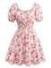 Robe manches bouffantes imprimé fleurs roses taille smockée des années 1950