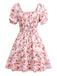 Robe manches bouffantes imprimé fleurs roses taille smockée des années 1950