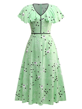 Robe à pois irréguliers à volants et col en V années 1940