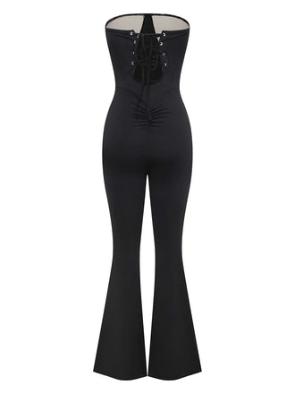 Combinaison évasée noire sans bretelles patchwork en dentelle des années 1970