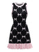 Robe noire à volants et imprimé nœud années 1960