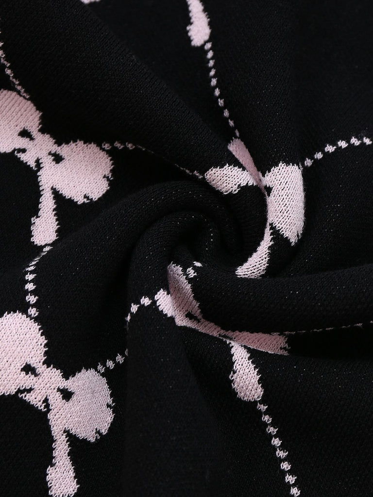 Robe noire à volants et imprimé nœud années 1960