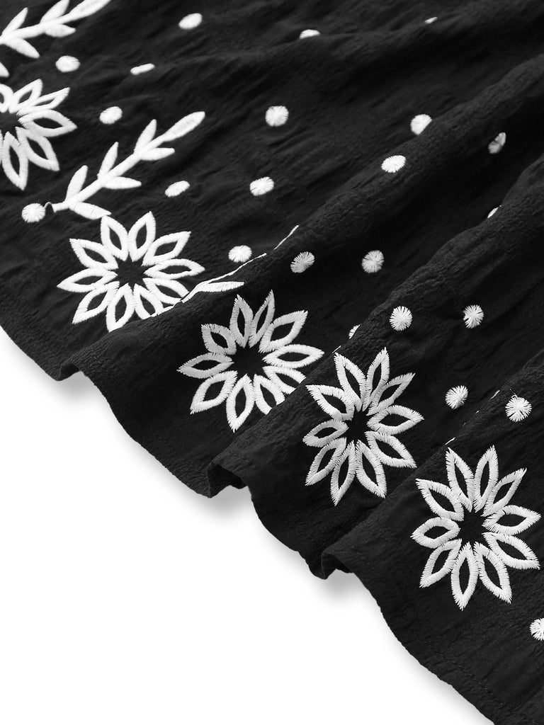 Robe noire bohème à fleurs brodées et nœud années 1970