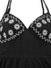 Robe noire bohème à fleurs brodées et nœud années 1970