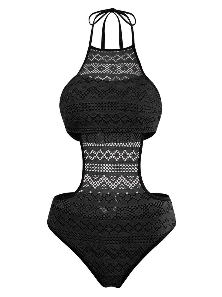 Vue de face du même modèle de monokini en dentelle géométrique, dans un coloris noir classique.