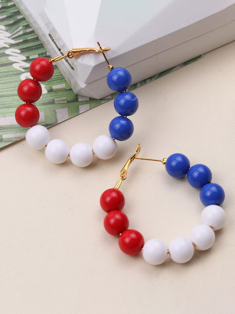 Boucles d'oreilles vintage en boules rouge blanche et bleue