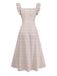 Pastel plaid swing dress with ruffled bow details and sweetheart neckline for 1950s vintage styling