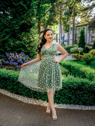 Robe trapèze verte en maille marguerite des années 1950