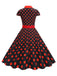 Robe trapèze à pois et nœud à revers des années 1950