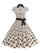 Robe trapèze à pois et nœud à revers des années 1950
