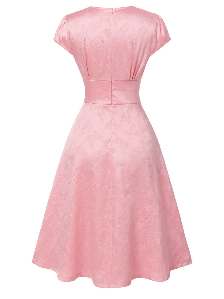 Robe en satin rose col V profond papillon jacquard des années 1940